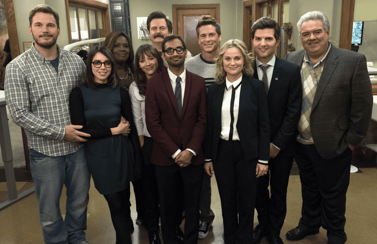 The cast of Parks and Recreation: Andy Dwyer (Chris Pratt), April Ludgate-Dwyer (Aubrey Plaza), Donna Meable (Retta), Ron Swanson (Nick Offerman), Tom Haverford (Aziz Ansari), Chris Traeger (Rob Lowe), Leslie Knope (Amy Poehler), Ben Wyatt (Adam Scott), Jerry/Garry/Larry/Terry/Barry Gergich (Jim O'Heir)